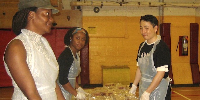 Volunteers prepping meals