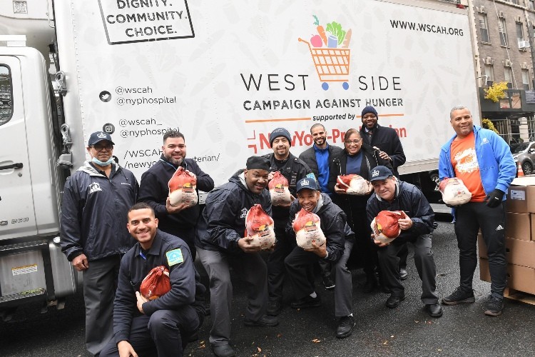 Group photo in front of WSCAH truck